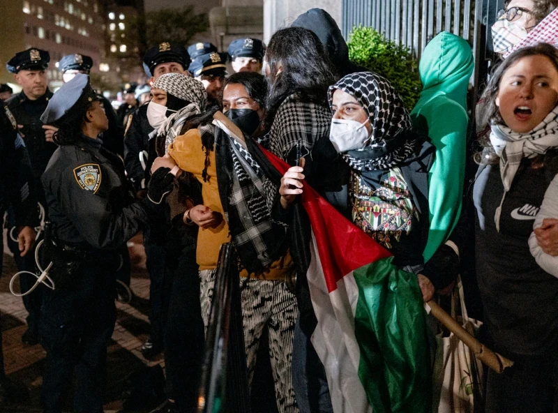 Pro-Palestinian protesters gathered with police nearby